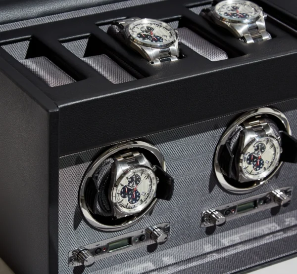 Side view of an open VICEROY triple watch winder in vegan leather, showing two watches in the winder and two in the storage