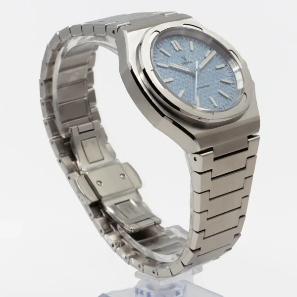 Side view of a Yema Urban Traveller with a light blue honeycomb dial